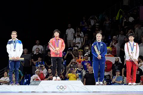 Paris Olympics women's freestyle 57kg wrestling: Moldova's Anastasia Nichita, silver, Japan's Tsugumi Sakurai, gold, Helen Louise Maroulis, of the United State, China's Kexin Hong, bronze